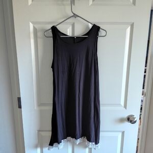 Elegant Black Sleeveless Dress with Lace Trim